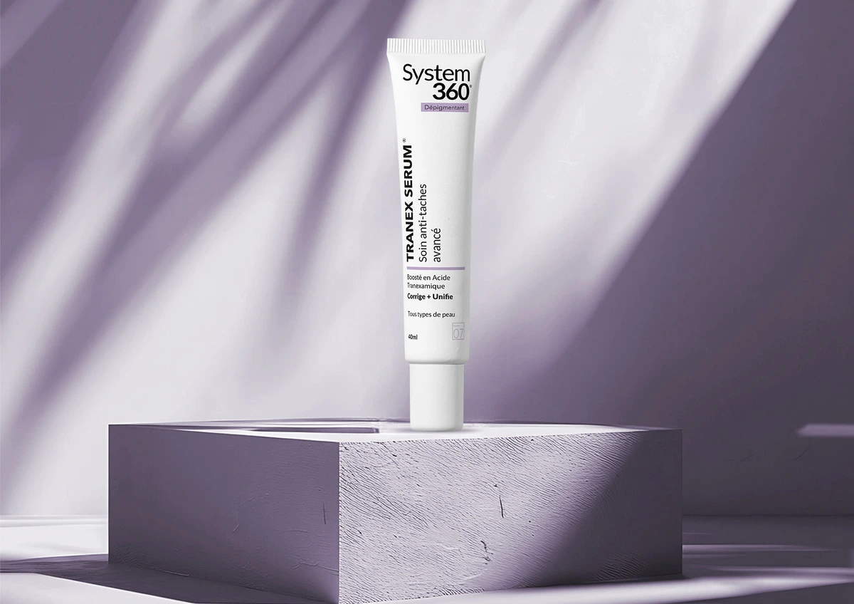 System360 Tranex Serum displayed on a lilac plinth in natural light